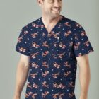 Man in a navy scrub top with playful animated reindeer pattern, smiling slightly to the side.