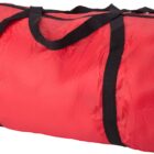 A red duffel bag with black handles and a zipper on top.