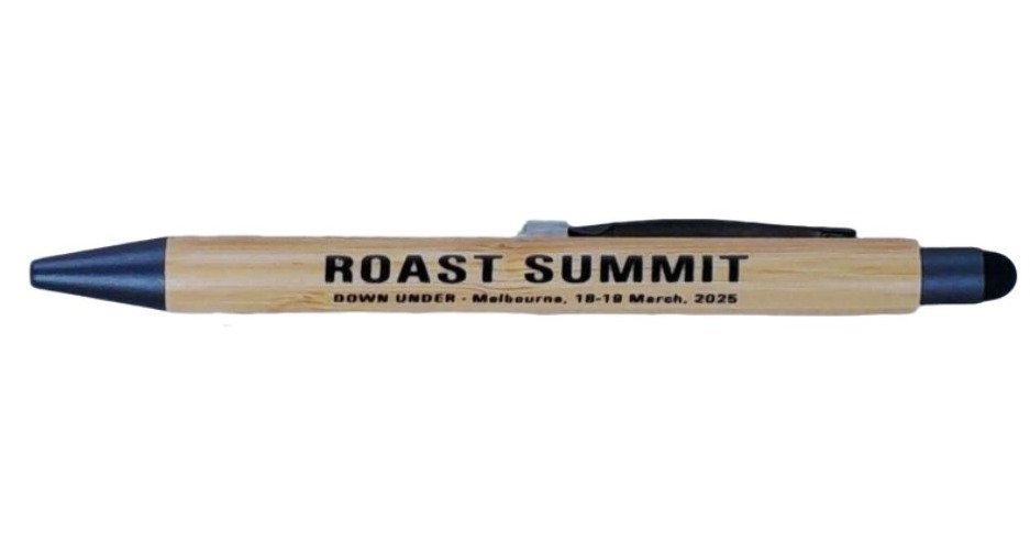 A wooden pen with ROAST SUMMIT, event details, and Sedex Number printed on the side.