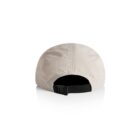 Beige cap viewed from the back with an adjustable black strap and buckle.