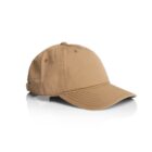 Tan baseball cap with a curved brim on a white reflective surface.