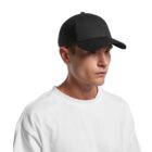 Man in a white t-shirt wearing a black baseball cap, facing slightly to the right.