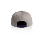 Beige baseball cap viewed from the back, showing an adjustable snap closure.