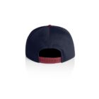 Back view of a navy blue baseball cap with a red adjustable snap closure.