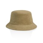A tan bucket hat made of soft, textured fabric on a white background.