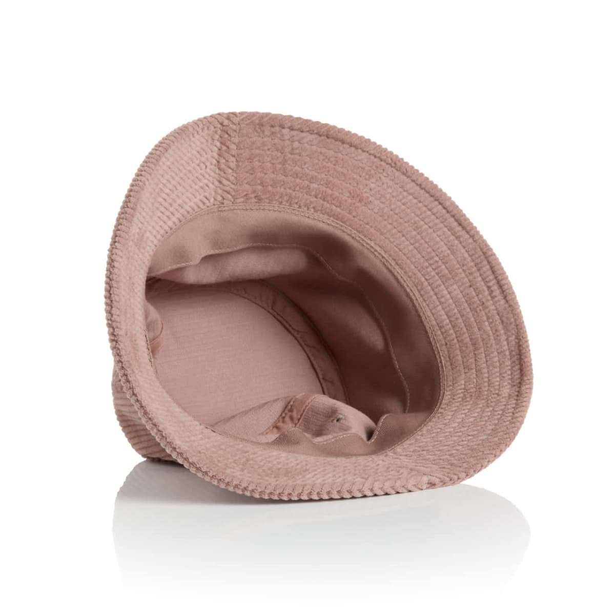 Pink bucket hat turned upside down, showing the inner lining and stitching details.