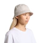 Person wearing a light beige bucket hat and a white t-shirt, facing right.