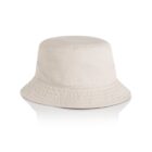 Beige bucket hat with a wide brim on a white background.