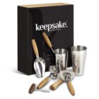 Bar tool set with wooden handles in front of a black Keepsake Collection box.