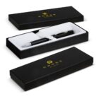 A black Cross pen in a black gift box with gold logo and white interior.