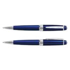 Two blue and silver pens, one with the clip visible, both lying horizontally.