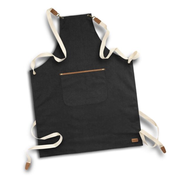 Black apron with tan straps and a front pocket, laid flat on a white background.