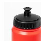 Close-up of a red plastic sports water bottle with a black screw cap and spout.