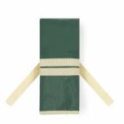 A folded green cloth napkin wrapped with a beige napkin ring and two tails on a white background.