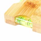 Close-up of a bamboo surface with a built-in bubble level indicator.