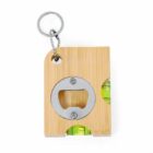 Wooden keychain with a bottle opener and built-in bubble level on a white background.