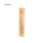A bamboo comb with fine teeth standing upright on a white background.