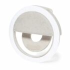 Round white and gray wall light fixture with a circular cutout in the center.