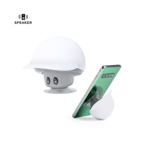 White mushroom-shaped speaker also used as a phone stand, holding a smartphone upright.