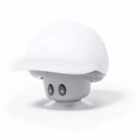 A small, round, gray speaker with a white cap and cartoon-like eyes on its front.