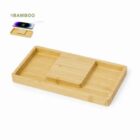 Rectangular bamboo phone holder and tray with a slot for a phone and small items.