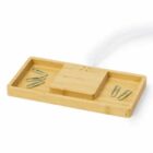 Rectangular bamboo tray with three sections, holding several silver paper clips.