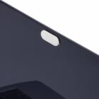 A close-up of a laptop webcam covered by a small, oval-shaped privacy cover.