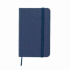 Closed blue notebook with an elastic band and a ribbon bookmark, on a white background.