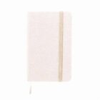 Closed beige fabric notebook with an elastic band and ribbon bookmark on white background.
