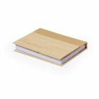 A closed book with a light brown cover lying flat on a white background.