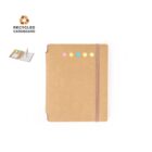 Brown recycled cardboard notebook with colored sticky notes and an elastic band closure.