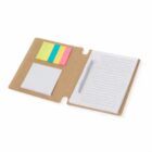 Open notebook with lined paper, sticky notes, and a pen on a brown folder.
