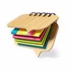 Speech bubble-shaped notepad with colorful sticky notes and a spiral binding.