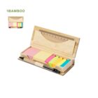 Open bamboo stationery box with sticky notes, a ruler, and a black pen inside.