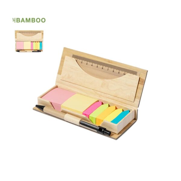 Bamboo desk organizer with sticky notes, ruler, and pen.