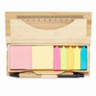 Set of sticky notes, colorful page markers, ruler, and black pen in a bamboo case.
