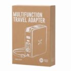 Brown box labeled MULTIFUNCTION TRAVEL ADAPTER with a sketch of the adapter.