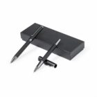 Two black pens with silver accents and a matching black box on a white background.