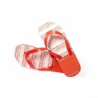 A pair of red and white striped flip-flops on a white background.
