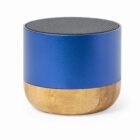 Small blue and bamboo portable speaker with a black mesh top, on a white background.