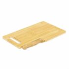 A wooden cutting board with a small knife partially tucked underneath it.