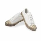 White sneakers with speckled rubber soles and toes, displayed on a white background.