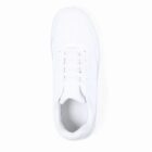 Top view of a plain white sneaker with white laces on a white background.