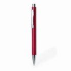 Red retractable ballpoint pen with a silver clip on a white background.