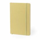 Closed beige notebook with elastic band, standing upright on a white background.