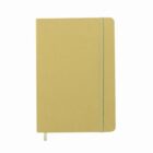 Closed beige notebook with elastic band and ribbon bookmark, viewed from above on white background.