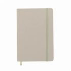 Closed beige notebook with an elastic band and a ribbon bookmark against a white background.