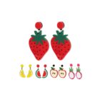 Six pairs of colorful fruit-themed earrings, including strawberry, lemon, watermelon, apple, and others.