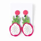 Colorful dragon fruit-shaped earrings with green tops and pink borders on a white background.