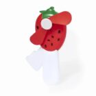 A handheld fan with blades shaped like a red strawberry and a white handle.